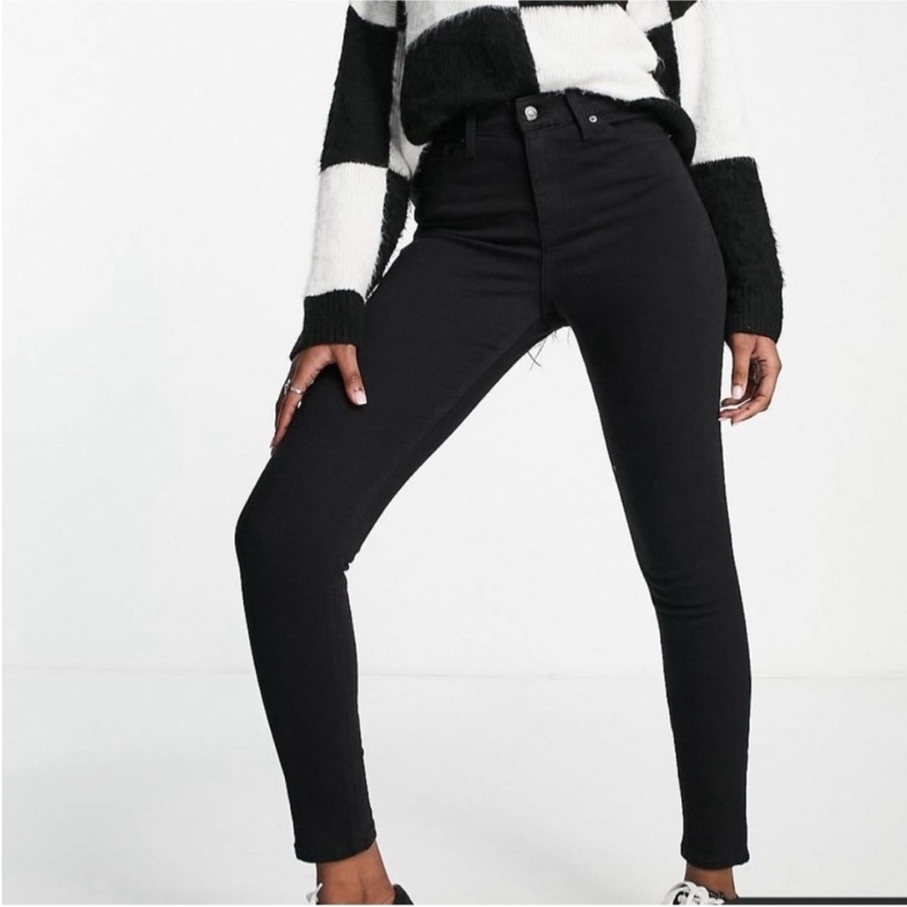 Topshop Leigh jeans in black Stretchy comfy Size 25